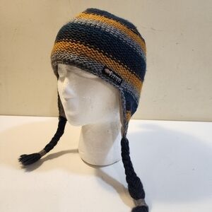 Everest Designs knit earflap hat features a striped pattern and braided tassels